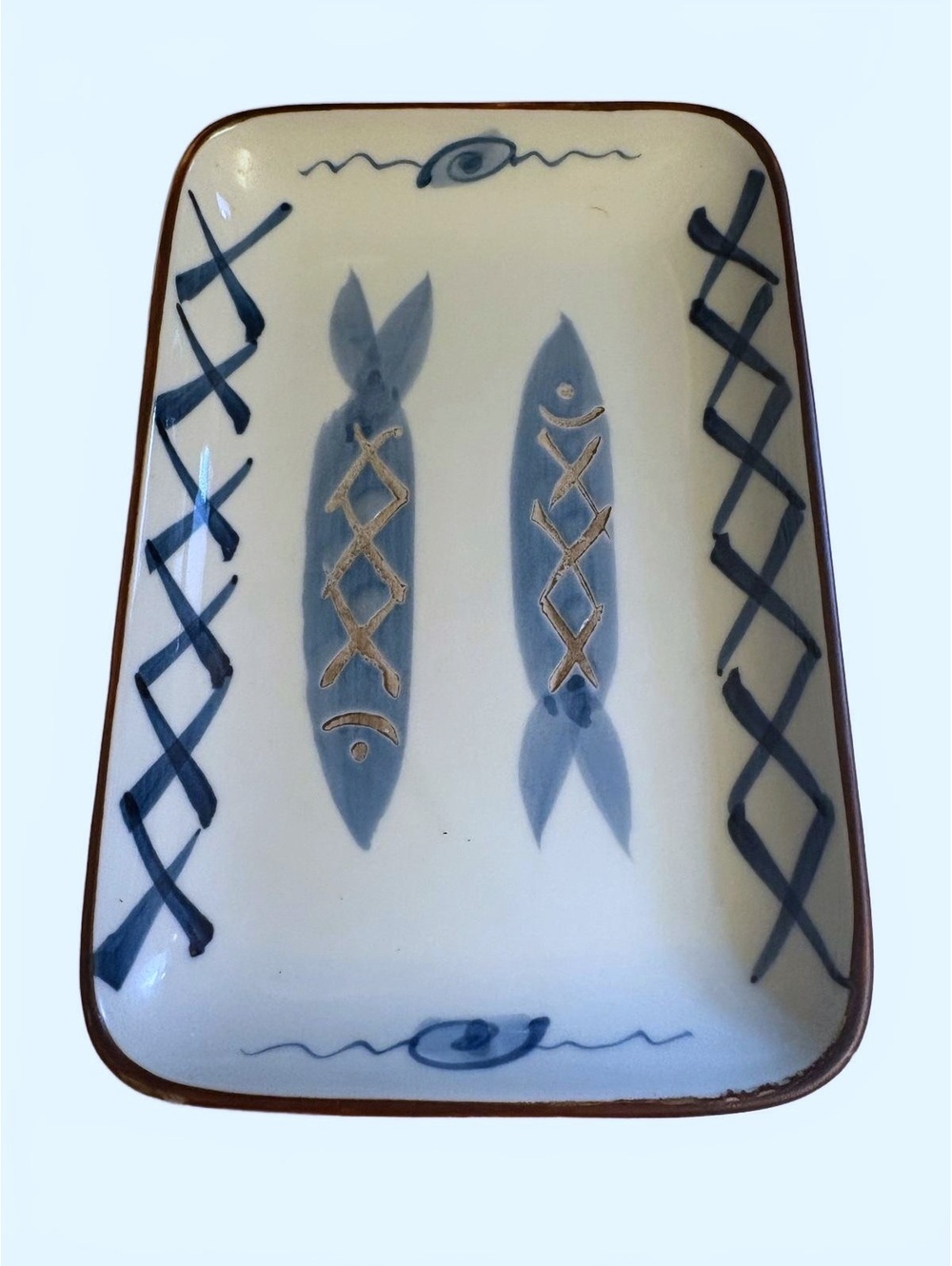 hand made and painted rectangular ceramic dish ft. a blue fish motif